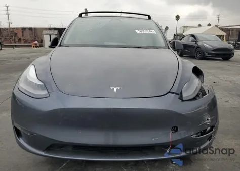 2022 Tesla Model Y из США, поврежденный, VIN 7SAYGDEF9NF405384